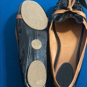 Kate Spade Glossy Black and Tan Loafers